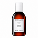 Sachajuan Thickening Shampoo in a 250 ml (8.4 fl. oz.) amber glass bottle with a white cap and a white label.