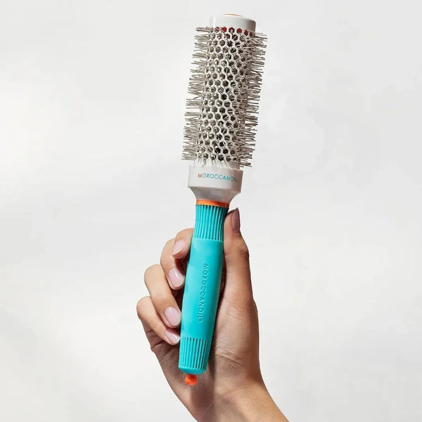 Moroccanoil Brush Medium Round C35being held