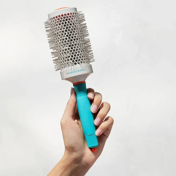 Moroccanoil Brush Large Round C55 being held 