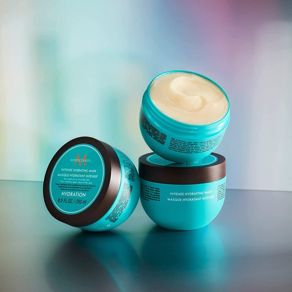 three tubs of Moroccanoil Intense Hydrating Mask
