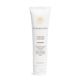A white tube of Innersense Hydrating Hair Mask with gold and brown text and logo, set against a plain white background.