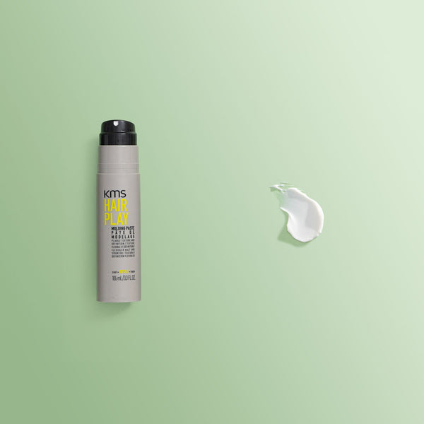 KMS Hair Play product on a green background