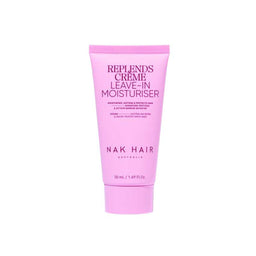 Pink tube of NAK Hair Replends Creme Leave-In Moisturiser on a white background