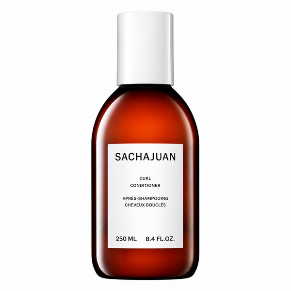 Sachajuan Curl Conditioner in a 250 ml amber glass bottle with a white cap and a white label, shown on a solid white background.