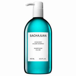 A 990 mL bottle of SACHAJUAN Ocean Mist Volume Shampoo, featuring a translucent teal body and a white pump dispenser, set against a plain white background.