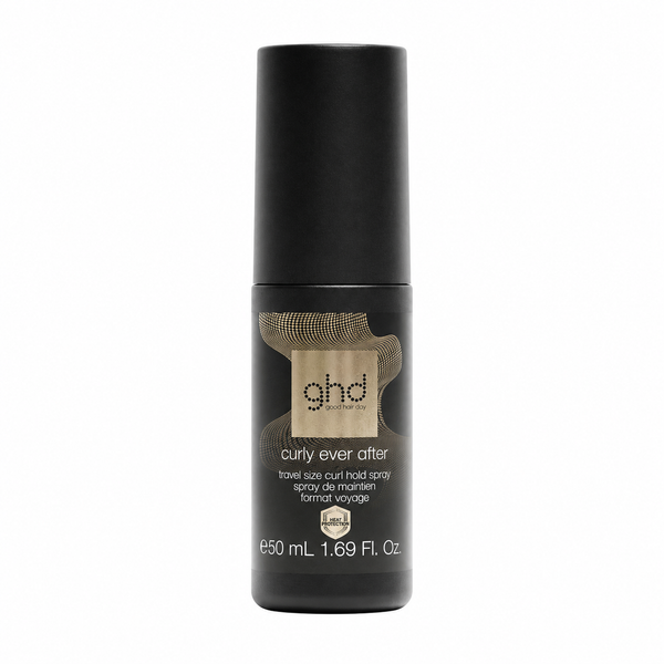 A bottle of ghd Curly Ever After travel size curl hold spray on a solid white background.